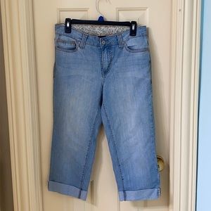 Blue jeans with flower details on the inside